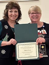 Upland Hills Health CEO presents Maria Leary with 2022 Rural Health Ambassador Award